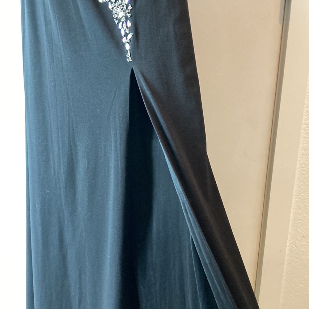 Long bejeweled black prom dress with thin straps and slit up to the thigh. - Picture 5 of 12